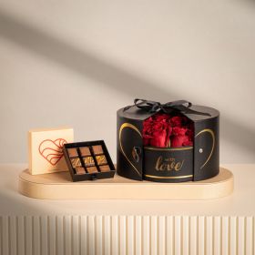 Surprise Love Arrangement with 9-Piece Addict Chocolate Box